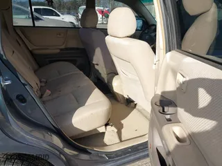 2006 Toyota Highlander with VIN JTEGP21AX60100267, listed as a IAAI auction lot 41440993 with 264,226 mi miles. Bid and sale history available at carsss.com. Image 8.