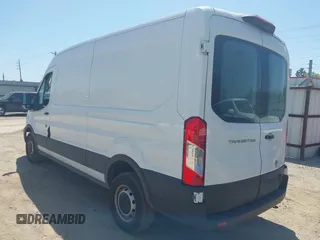 2021 Ford Transit Cargo with VIN 1FTBR1C8XMKA64837, listed as a IAAI auction lot 42008582 with 74,562 mi miles and . Bid and sale history available at DreamBid. Image 3.