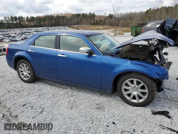 2009 Chrysler 300 LX with VIN 2C3KA43D29H581073, listed as a Copart auction lot 48702345 with 142,917 mi miles and Salvage Title. Bid and sale history available at carsss.com. Image 4.