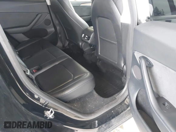 2023 Tesla Model Y Long Range with VIN 7SAYGDEE4PF789102, listed as a IAAI auction lot 41788860 with 88,457 mi miles and . Bid and sale history available at DreamBid. Image 8.