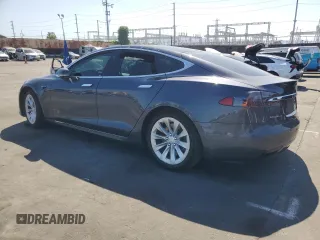 2019 Tesla Model S 75D with VIN 5YJSA1E2XKF305595, listed as a Copart auction lot 51838965 with Not provided miles and Salvage title. Bid and sale history available at DreamBid. Image 2.