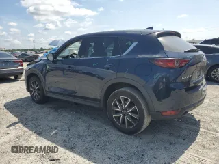 2018 Mazda CX-5 Grand Touring with VIN JM3KFADM1J1387297, listed as a Copart auction lot 60589625 with 92,283 mi miles and Non repairable. Bid and sale history available at DreamBid. Image 2.