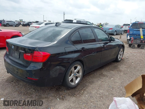 2015 BMW 3 Series 328i with VIN WBA3C1C5XFP852807, listed as a IAAI auction lot 42043565 with 120,048 mi miles and . Bid and sale history available at carsss.com. Image 4.