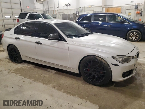 2013 BMW 3 Series 335i with VIN WBA3A9G51DNP36712, listed as a Copart auction lot 52407465 with 117,972 mi miles and Salvage title. Bid and sale history available at DreamBid. Image 4.