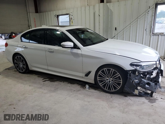 2018 BMW 5 Series 540i xDrive with VIN WBAJE7C53JWC54662, listed as a Copart auction lot 63703595 with 96,523 mi miles and Salvage title. Bid and sale history available at DreamBid. Image 4.
