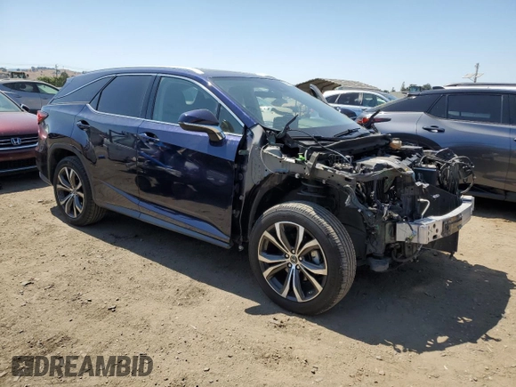 2020 Lexus RX 350L with VIN JTJHZKFA1L2021675, listed as a Copart auction lot 62547055 with 86,461 mi miles and Salvage title. Bid and sale history available at DreamBid. Image 4.