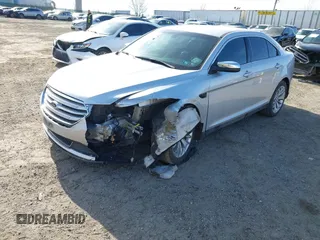 2014 Ford Taurus Limited with VIN 1FAHP2F86EG134779, listed as a IAAI auction lot 41660527 with 115,016 mi miles. Bid and sale history available at carsss.com. Image 6.