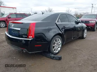 2008 Cadillac CTS RWD w/1SB with VIN 1G6DR57V580176739, listed as a IAAI auction lot 41847461 with 136,482 mi miles. Bid and sale history available at carsss.com. Image 4.