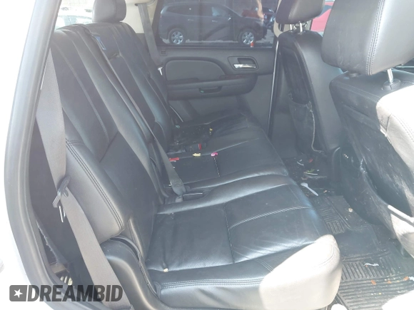 2009 GMC Yukon SLT w/4SA with VIN 1GKFK33059R282974, listed as a IAAI auction lot 42013219 with 209,240 mi miles. Bid and sale history available at carsss.com. Image 8.