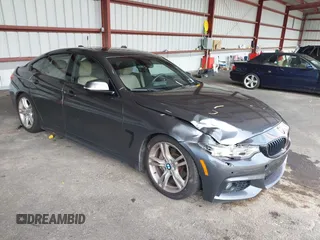 2016 BMW 4 Series 428i xDrive z VIN WBA4C9C58GG140641, wystawiony jako IAAI lot #42660510 z przebiegiem 194 224 mil mil oraz . Historia ofert i sprzedaży dostępna na DreamBid. Obrazek 1.