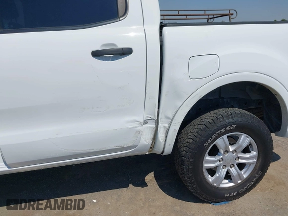 2021 Ford Ranger XL z VIN 1FTER4EH5MLE05003, wystawiony jako IAAI lot #42649042 z przebiegiem 62 571 mil mil oraz . Historia ofert i sprzedaży dostępna na DreamBid. Obrazek 6.