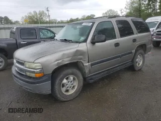 2001 Chevrolet Tahoe LT with VIN 1GNEC13T51R197521, listed as a Copart auction lot 51053265 with 319,590 mi miles and Salvage Title. Bid and sale history available at carsss.com. Image 1.