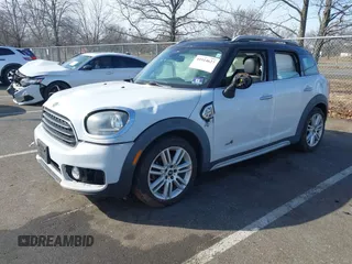 2019 MINI Countryman Cooper with VIN WMZYV5C55K3E05106, listed as a IAAI auction lot 41514627 with 69,399 mi miles. Bid and sale history available at carsss.com. Image 18.