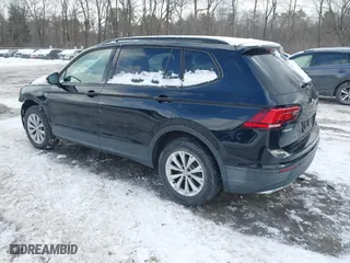2019 Volkswagen Tiguan S with VIN 3VV0B7AX9KM047642, listed as a IAAI auction lot 41523269 with 61,221 mi miles. Bid and sale history available at carsss.com. Image 3.
