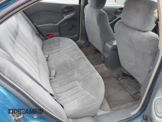 1999 Pontiac Grand Am SE2 with VIN 1G2NE52T2XM904094, listed as a IAAI auction lot 41746997 with 0 mi miles. Bid and sale history available at carsss.com. Image 8.