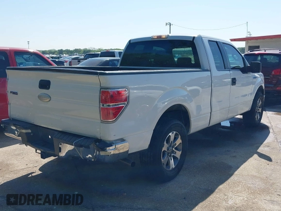 2009 Ford F-150 STX with VIN 1FTRX12W89KC52056, listed as a IAAI auction lot 41982659 with 318,539 mi miles. Bid and sale history available at carsss.com. Image 4.