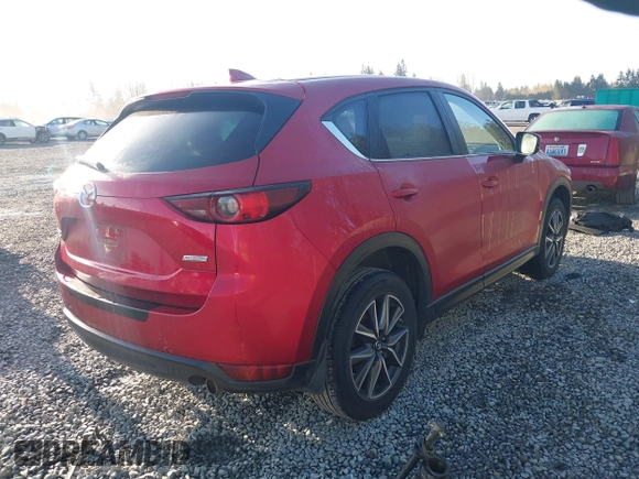 2018 Mazda CX-5 Touring with VIN JM3KFBCM8J0472991, listed as a IAAI auction lot 41959737 with 82,843 mi miles. Bid and sale history available at carsss.com. Image 4.