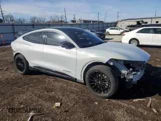 2021 Ford Mustang Mach-E Premium with VIN 3FMTK3SU6MMA01693, listed as a Copart auction lot 47369255 with 71,235 mi miles and Salvage Title. Bid and sale history available at DreamBid. Image 4.