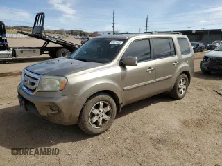 2011 Honda Pilot Touring with VIN 5FNYF4H92BB046932, listed as a Copart auction lot 49811465 with 176,295 mi miles and Salvage Title. Bid and sale history available at carsss.com. Image 1.