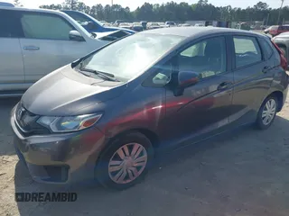 2015 Honda Fit LX with VIN 3HGGK5H52FM771511, listed as a IAAI auction lot 42132749 with 96,666 mi miles and . Bid and sale history available at DreamBid. Image 17.