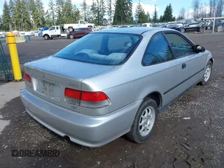 1999 Honda Civic HX with VIN 1HGEJ7122XL020224, listed as a IAAI auction lot 41723460 with 202,759 mi miles. Bid and sale history available at carsss.com. Image 4.