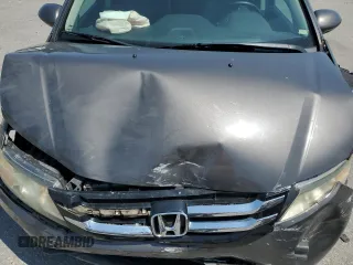 2014 Honda Odyssey Touring with VIN 5FNRL5H93EB061754, listed as a Copart auction lot 55182015 with 168,058 mi miles and Salvage title. Bid and sale history available at DreamBid. Image 12.