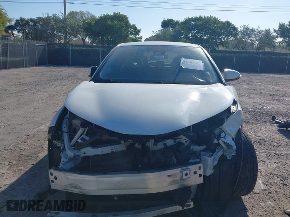 2021 Toyota C-HR LE with VIN NMTKHMBX6MR121247, listed as a IAAI auction lot 41701773 with 57,743 mi miles. Bid and sale history available at carsss.com. Image 6.