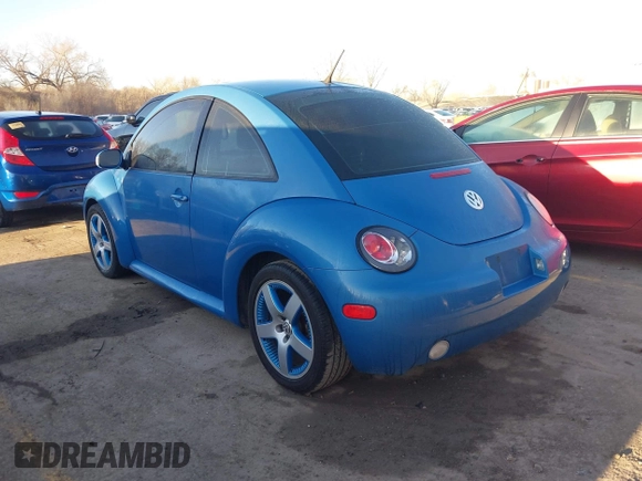 2004 Volkswagen New Beetle Coupe Satellite Blue with VIN 3VWGK31C84M420043, listed as a IAAI auction lot 41871049 with 251,646 mi miles. Bid and sale history available at carsss.com. Image 3.