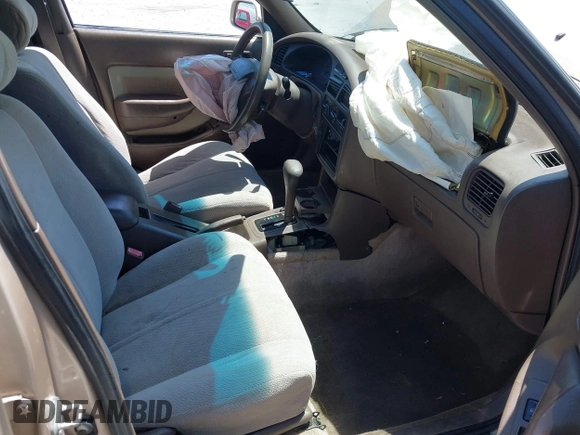 1995 Toyota Camry LE z VIN 4T1SK12E8SU872841, wystawiony jako IAAI lot #42025861 z przebiegiem 228 747 mil mil oraz . Historia ofert i sprzedaży dostępna na DreamBid. Obrazek 5.