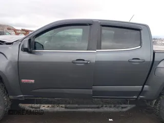 2016 GMC Canyon 4WD SLE with VIN 1GTG6CE37G1282630, listed as a IAAI auction lot 41153472 with 57,809 mi miles. Bid and sale history available at carsss.com. Image 14.