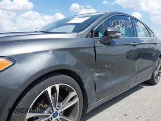 2017 Ford Fusion Titanium with VIN 3FA6P0D93HR261526, listed as a IAAI auction lot 42277350 with 117,388 mi miles and . Bid and sale history available at DreamBid. Image 6.