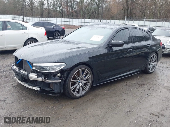 2018 BMW 5 Series M550i xDrive with VIN WBAJB9C59JB049114, listed as a IAAI auction lot 41543633 with 87,942 mi miles and . Bid and sale history available at carsss.com. Image 19.