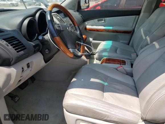 2007 Lexus RX 350 with VIN 2T2HK31U77C024338, listed as a Copart auction lot 59391825 with 196,238 mi miles and Salvage title. Bid and sale history available at DreamBid. Image 7.