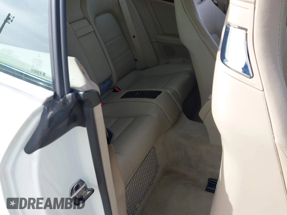 2011 Mercedes-Benz E-Class E 550 with VIN WDDKK7CF4BF093607, listed as a IAAI auction lot 41596557 with 128,548 mi miles. Bid and sale history available at carsss.com. Image 8.