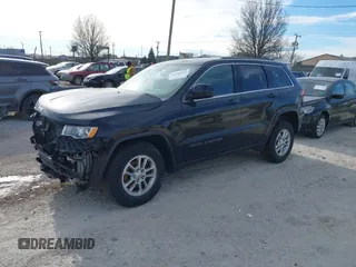 2018 Jeep Grand Cherokee Laredo E with VIN 1C4RJFAG7JC244103, listed as a IAAI auction lot 41260642 with 116,797 mi miles. Bid and sale history available at carsss.com. Image 2.