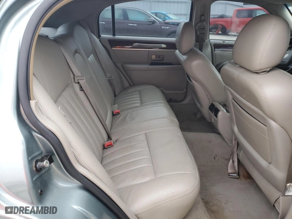 2004 Lincoln Town Car Signature with VIN 1LNHM81W34Y607067, listed as a Copart auction lot 42413965 with 106,973 mi miles and Salvage Title. Bid and sale history available at carsss.com. Image 10.