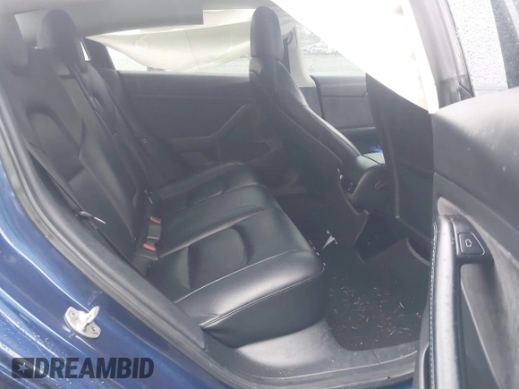 2022 Tesla Model 3 Long Range with VIN 5YJ3E1EB1NF142574, listed as a IAAI auction lot 41213900 with 127,404 mi miles and . Bid and sale history available at DreamBid. Image 8.