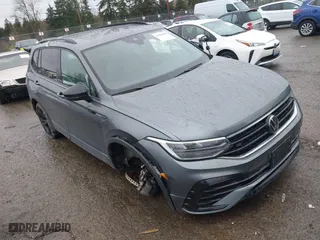 2023 Volkswagen Tiguan SE R-Line Black with VIN 3VVCB7AX0PM132194, listed as a IAAI auction lot 41594049 with 15,080 mi miles. Bid and sale history available at carsss.com. Image 1.