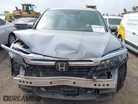 2019 Honda Ridgeline RTL-E with VIN 5FPYK3F73KB006244, listed as a IAAI auction lot 42167460 with 53,498 mi miles and . Bid and sale history available at DreamBid. Image 13.