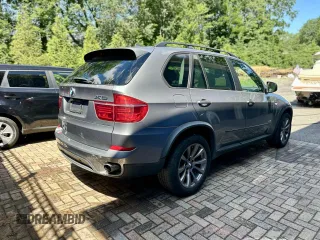 2012 BMW X5 35i with VIN 5UXZV4C55CL986439, listed as a Copart auction lot 63034725 with 188,238 mi miles and Clean title. Bid and sale history available at DreamBid. Image 3.
