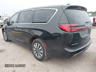 2023 Chrysler Pacifica Hybrid Touring L z VIN 2C4RC1L77PR631132, wystawiony jako IAAI lot #42391834 z przebiegiem 61 868 mil mil oraz . Historia ofert i sprzedaży dostępna na DreamBid. Obrazek 3.