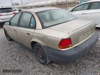 1999 Saturn SL with VIN 1G8ZH5282XZ273375, listed as a IAAI auction lot 41787290 with 230,397 mi miles. Bid and sale history available at carsss.com. Image 3.