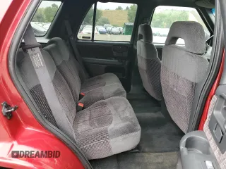 1997 GMC Jimmy SLS with VIN 1GKDT13W8V2515536, listed as a Copart auction lot 66701094 with 123,051 mi miles and Salvage Title. Bid and sale history available at carsss.com. Image 10.