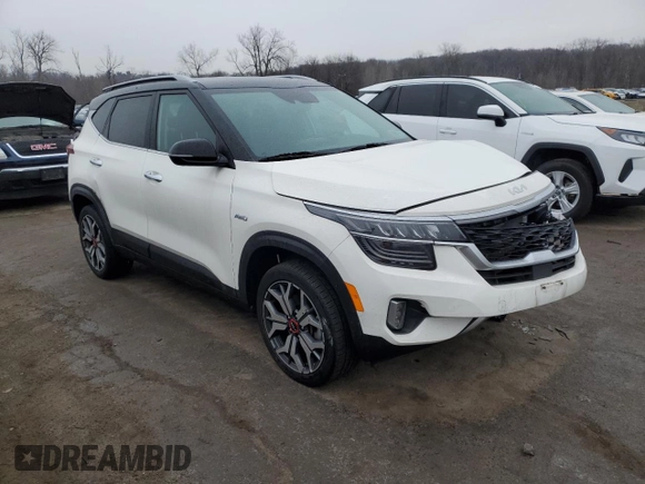 2022 Kia Seltos SX with VIN KNDETCA23N7299979, listed as a Copart auction lot 42940095 with 27,315 mi miles and Salvage title. Bid and sale history available at DreamBid. Image 4.
