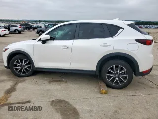 2018 Mazda CX-5 Touring z VIN JM3KFACM0J0469433, wystawiony jako Copart lot #54349955 z przebiegiem Nie podano mil oraz Szkoda całkowita • Salvage title. Historia ofert i sprzedaży dostępna na DreamBid. Obrazek 2.