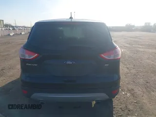 2015 Ford Escape SE with VIN 1FMCU0G79FUA40322, listed as a IAAI auction lot 41791960 with 124,543 mi miles. Bid and sale history available at carsss.com. Image 16.