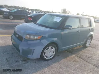 2008 Scion xB with VIN JTLKE50E581004400, listed as a IAAI auction lot 42012956 with 164,438 mi miles. Bid and sale history available at carsss.com. Image 2.