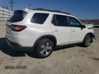 2024 Honda Pilot EX-L 8 Passenger with VIN 5FNYG1H46RB026726, listed as a Copart auction lot 79063614 with 4,169 mi miles and Salvage Title. Bid and sale history available at carsss.com. Image 3.
