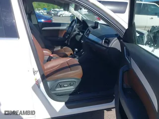 2015 Audi Q3 2.0T Premium Plus with VIN WA1EFCFS7FR010697, listed as a IAAI auction lot 41948566 with 167,001 mi miles. Bid and sale history available at carsss.com. Image 5.