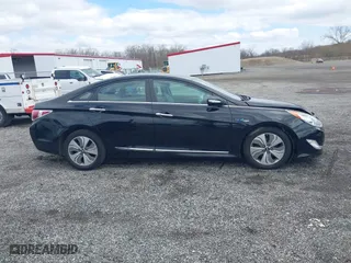 2015 Hyundai Sonata Hybrid Limited with VIN KMHEC4A44FA122722, listed as a IAAI auction lot 41817351 with 144,286 mi miles. Bid and sale history available at carsss.com. Image 14.